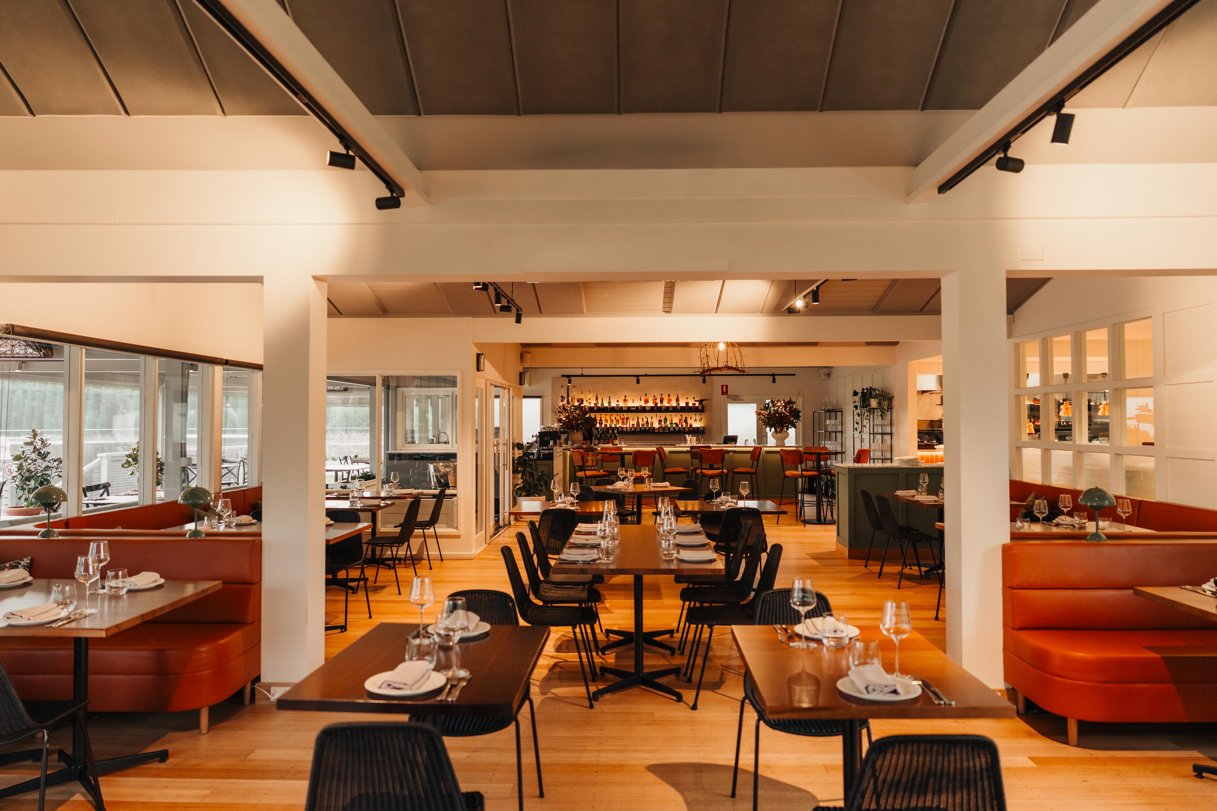 The restaurant dining room, looking through to the bar