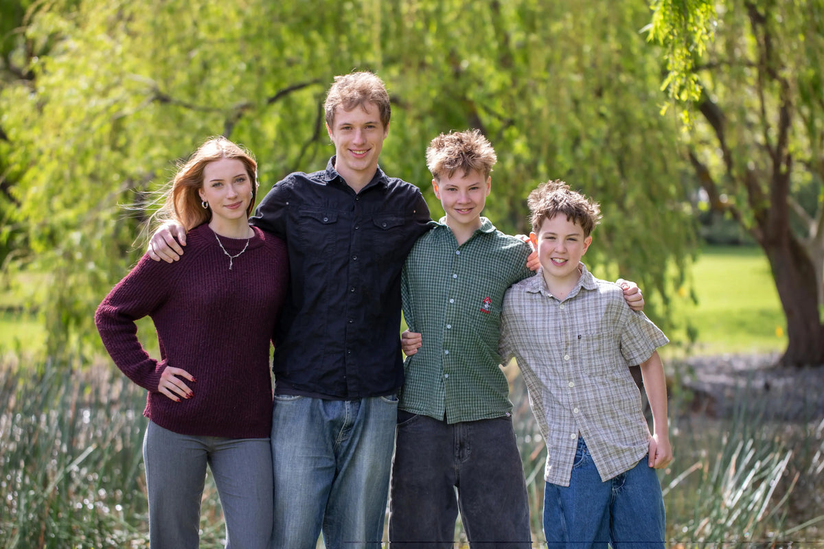 Crittenden family's youngest children, standing together smiling and standing in The Terrace